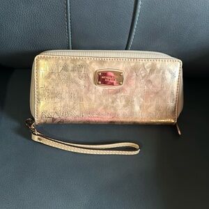 Michael Kors rose gold wallet/wristlet. NWOT